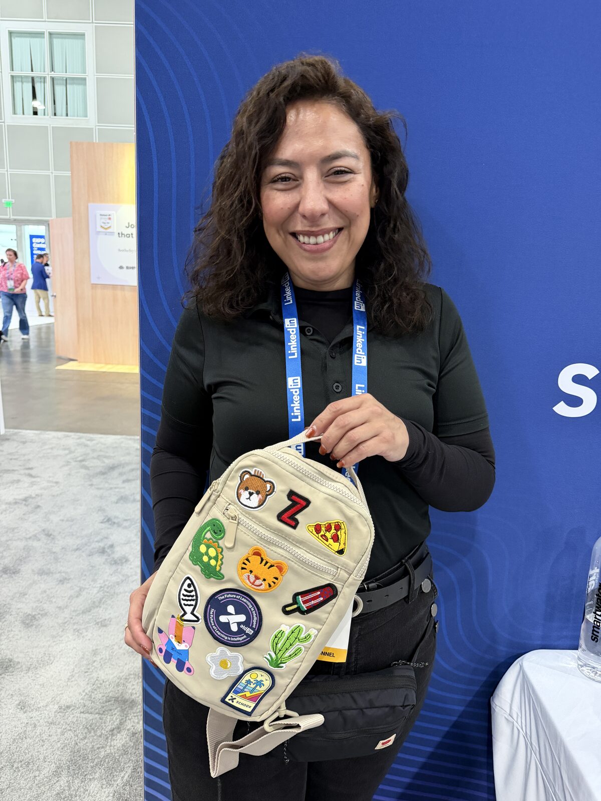 Finished tote bag covered in custom patches from an Event Patch Bar station